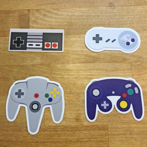 Nintendo, Super Nintendo, Nintendo 64, and Gamecube controllers picture